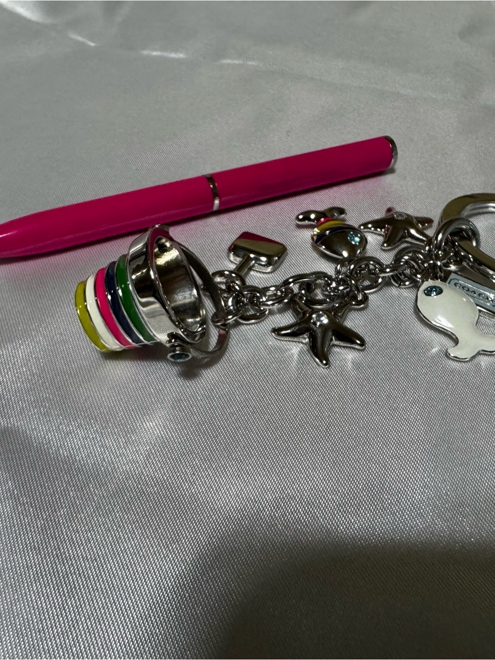 Coach Beach Themed charm and pink pen